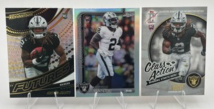 Lot Of 3 Ashton Jeanty Rookie Cards Including 2025 Topps Chrome Refractor #322, 2025 Panini Revolution Football #18, And 2025 Topps Signature Class Class Action #CA-17