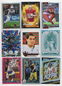 Lot Of 9 Assorted Football Cards Including Panini Phoenix Contours DeVon Achane #20, 2026 Topps Flagship Carson Beck Refractor RC #305, And More