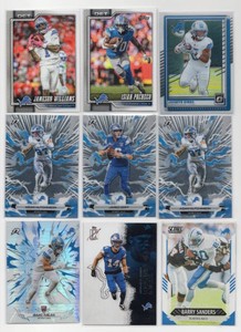 Lot Of 9 Detroit Lions Football Cards Including 2026 Topps Resurgence Isaac TeSlaa Refractor RC #132, 2025 Panini Donruss Optic Jahmyr Gibbs #79, And More