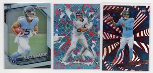 Lot Of 3 Tennesee Titans Football Cards Including 2025 Panini Revolutions Cam Ward Red Cosmo RC #205, 2026 Topps Resurgence Gunner Helm Aqua Laser #196, And More