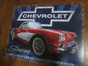 Chevrolet metal sign measures 12 x 14 inches