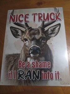 Buck deer season metal sign measures 12 x 14 inches