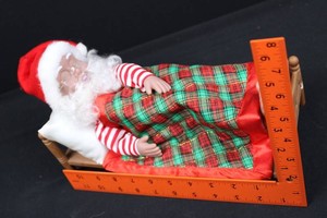 Snoring Santa Claus Christmas Doll in Wooden Bed With Plaid Blanket