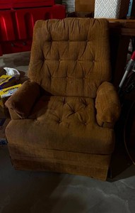vintage brown swivel arm chair