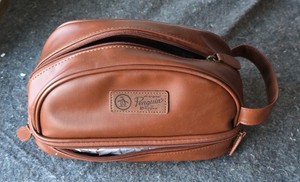 Small faux leather travel bag