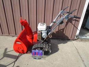 Honda track snow blower. Runs wells. Tested & works. As shown.