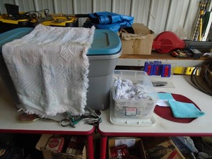 2 rubber maid tubs with misc house hold. As shown.