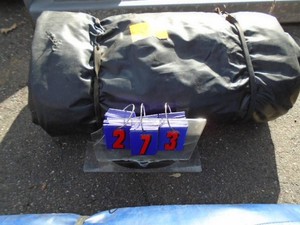 Black heavy truck tarp. Used condition. See picture for size. As shown.