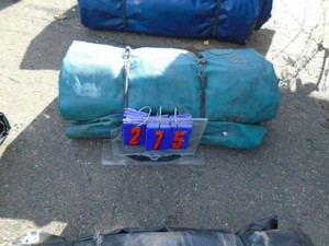 Green heavy truck tarp. Used condition. See picture for size. As shown.