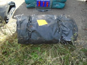 Black heavy truck tarp. Used condition. See picture for size. As shown.