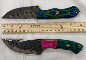 Fixed-blade HuntingSkinning Knife and a Gut-hook Skinning Knife.(MHS Cutlery Works)