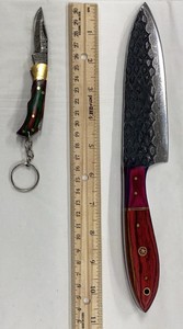 Chefs Utility Knife and a Pocket Knife.