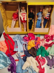 Assortment of Barbies, Clothes & Vintage Carrier