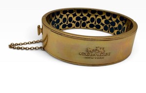 Coach Gold-Tone Signature C Hinged Bangle Bracelet