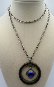 Circular Openwork Pendant Necklace With Blue Centerpiece