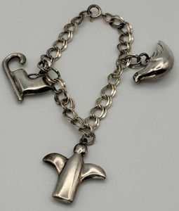 Sterling Charm Bracelet With Three Novelty Charms