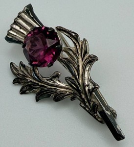 Sterling Thistle Motif Brooch With Faceted Purple Stone