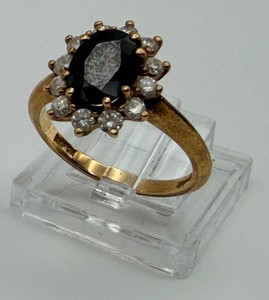 Size 6 Ring With Black Center Stone - Marked 14KP GM