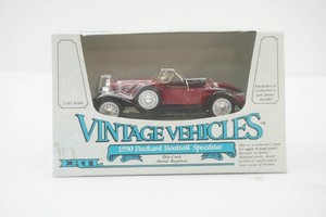 NIP Ertl 143 scale Die Cast Metal Vintage Vehicles 1930 Packard Boattail Speedster