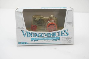 NIP Ertl 143 scale die Cast Metal Vintage Vehicles McCormick-Deering Farmall