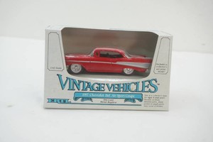 NIP Ertl 143 scale Die Cast Metal Vintage Vehicles 1957 Chevrolet Bel Air Sport Coupe