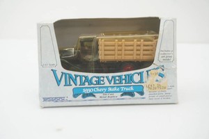NIP Ertl 143 scale Die Cast Metal Vintage Vehicles 1930 Chevy Stake Truck