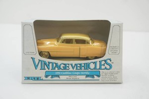 NIP Ertl 143 scale Die Cast Metal Vintage Vehicles 1952 Cadillac Coupe DeVille
