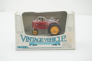 NIP Ertl 143 scale Die Cast Metal Vintage Vehicles Massey-Harris 44 Tractor