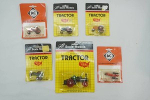 NIP Allis Chalmers 164 die cast metal WC (2) and 4 Scale Model Die Cast 164 scale tractors