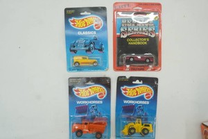 3 Hot Wheels and 1 Ertl NIP die cast 164 scale toys