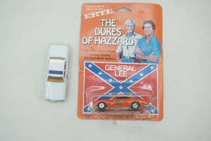 Ertl General Lee NIP and the Sheriff Rosco patrol car 164 scale die cast metal