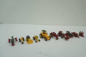 group of die cast metal 164 scale tractors and implements