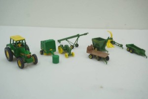 John Deere die cast 164 scale tractors and implements