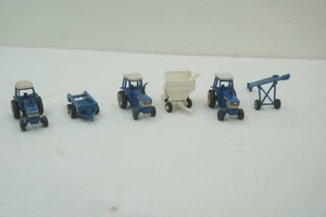 Ford die cast metal 164 scale tractors and implements