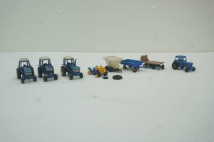 Ford die cast metal 164 scale tractors and implements