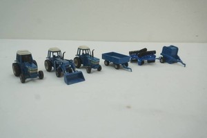 Ford die cast metal 164 scale tractors and implements