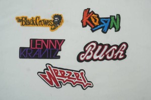 Collection of 5 embroidered musical artist and rock band logo patches. The Black Crowes, Korn, Lenny Kravitz, Bush, Weezer