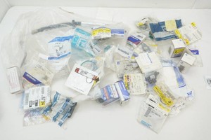 large assortment of NIP GM auto parts includes seal, bearings, hose, gaskets, and more