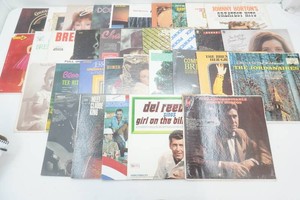 large group of vintage vinyl albums including Charlie Rich, Brenda Lee, Johnny Horton, The Judds, Waylon Jennings and more