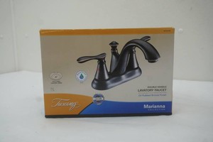 used double handle lavatory faucet (not original box)