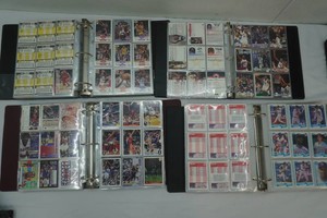 4 large binders full of sports trading cards