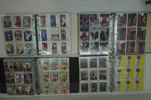 4 large binders full of sports trading cards