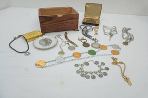 wooden jewelry box loaded with costume jewelry, gold foil playing cards, and more