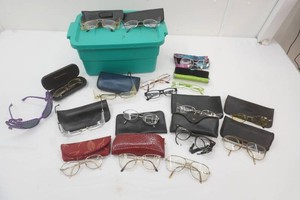 tote full of vintage prescription glasses and cases