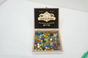vintage premium Tabacco box filled with vintage marbles