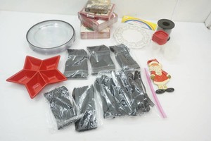 nice supply of plastic plates and silverware, napkins, and more