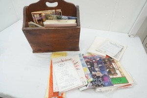 vintage wooden magazine rack with crochet and craft booklets and magazines