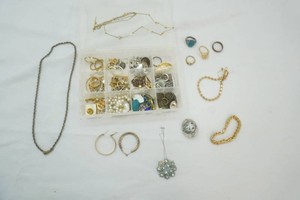 small organizer container filled with jewelry
