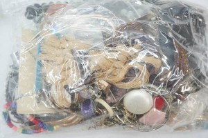 large bag of jewelry parts and craft items