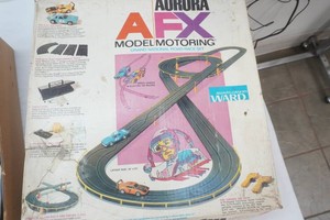 vintage aurora AFX Grand National Road Set comes with track, controls, cars, and accessories